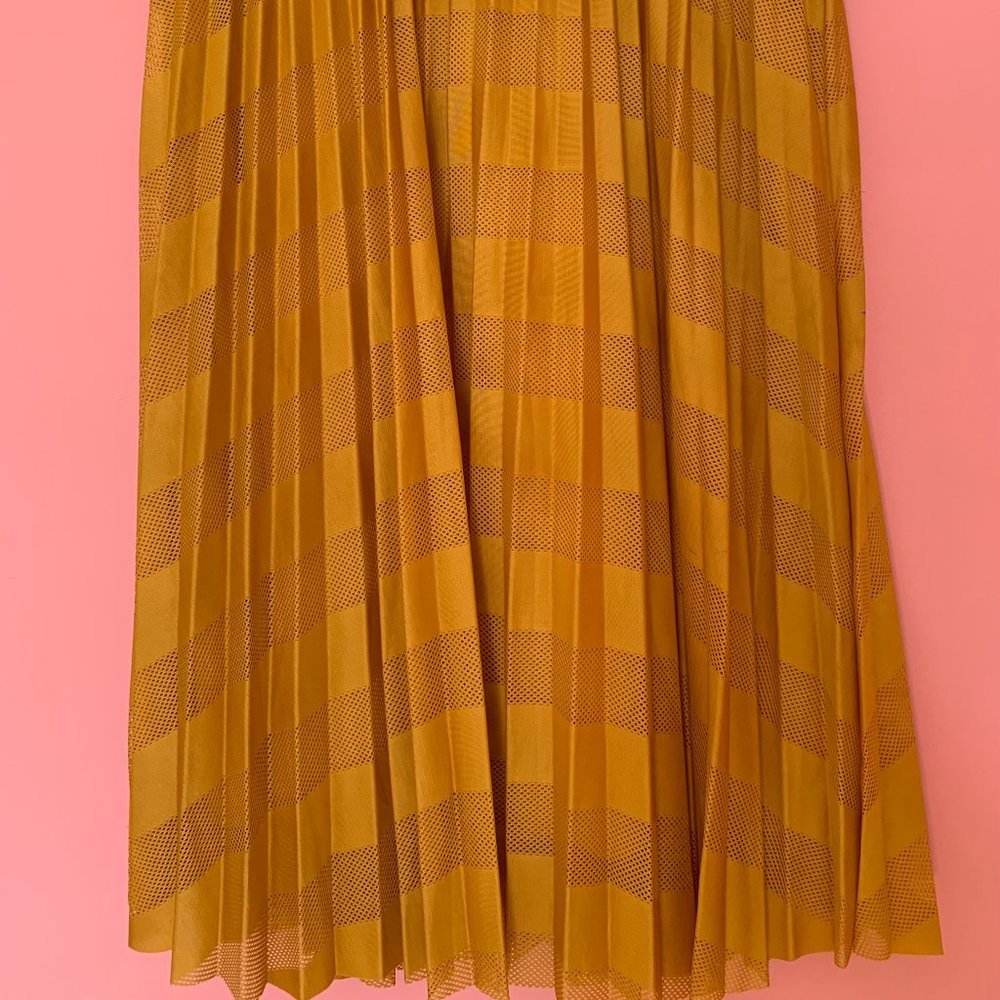 Pleated yellow skirt